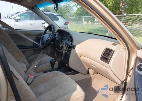 2001 Hyundai Elantra Gls z USA, uszkodzony, nr VIN KMHDN45DX1U150063